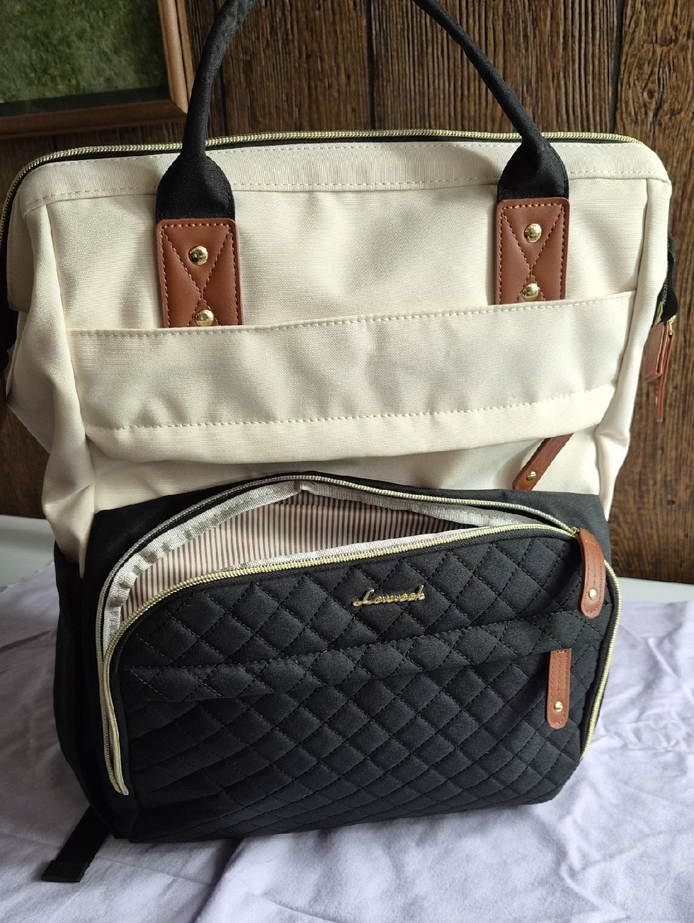 Quilted Black & Cream Canvas Backpack with Brown Trim